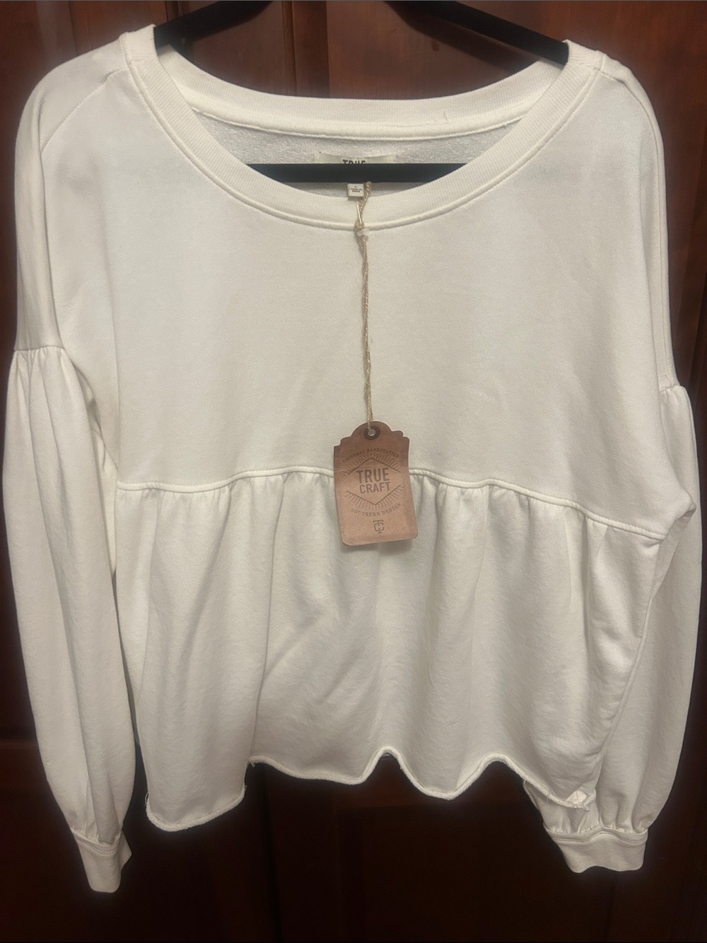 True Craft Cream Peplum Pullover Sweatshirt